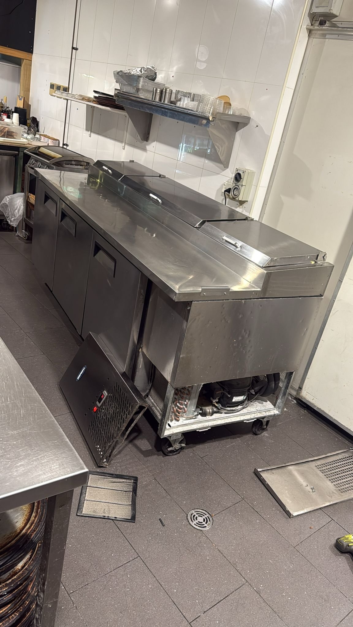 Servicing clients prep fridge at Bondi pizza Parramatta
